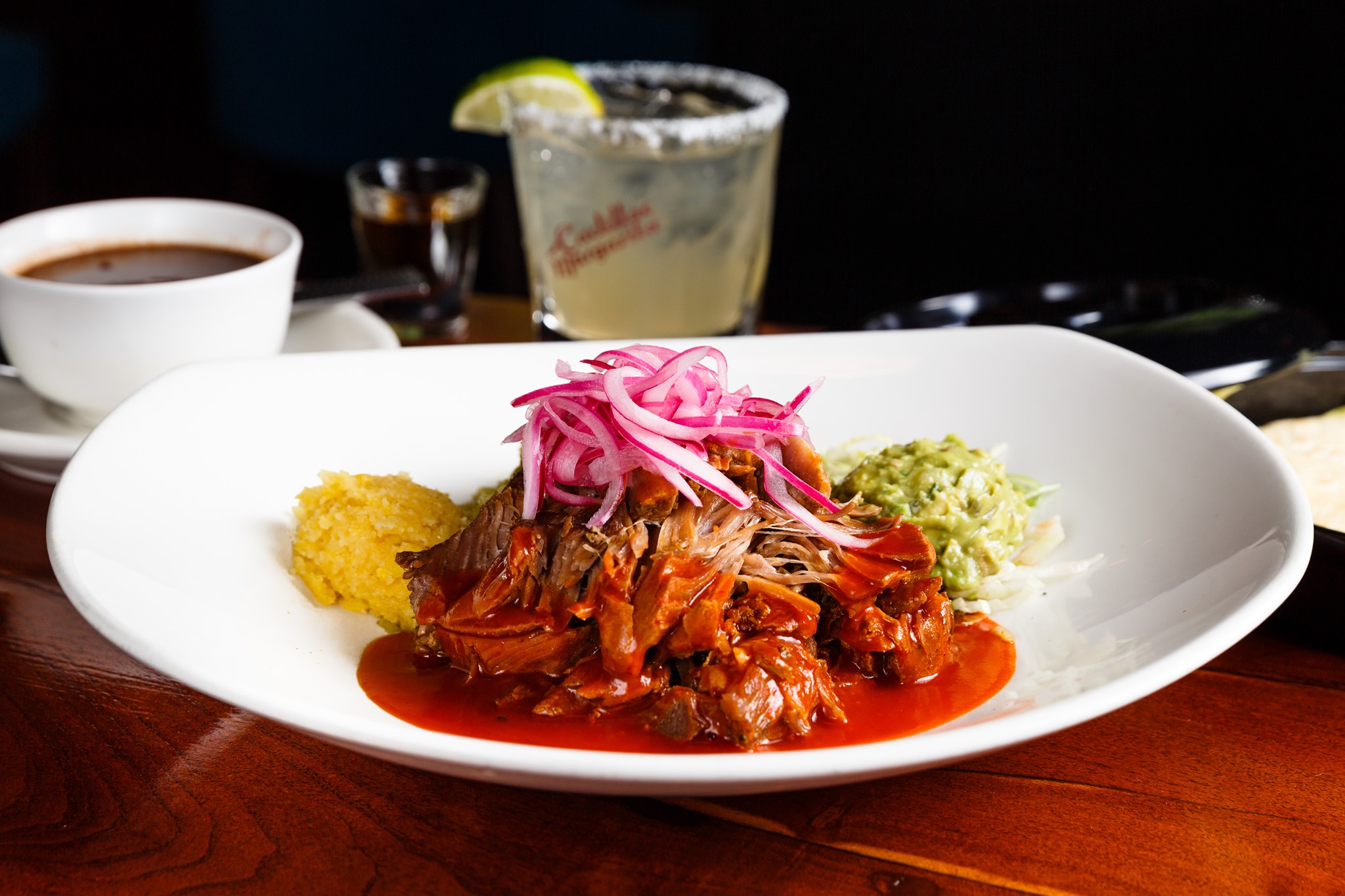 a plate of food with a drink